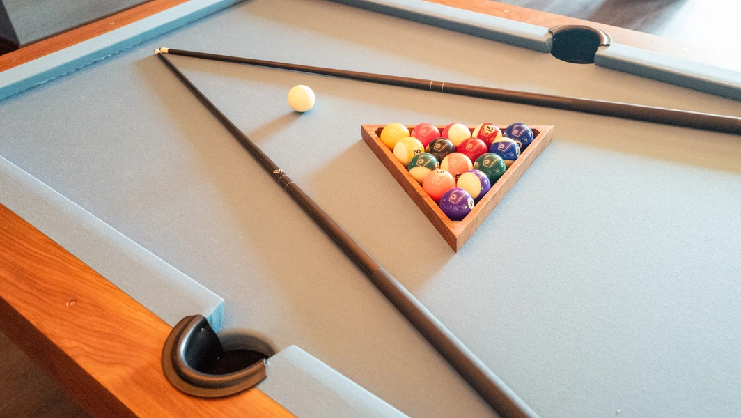 Varieties and designs of pool and billiard tables