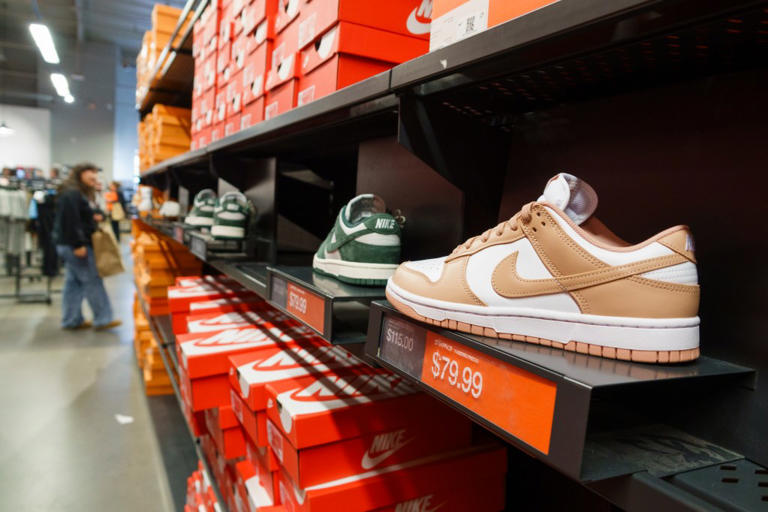 Nike issues bleak forecast, plans to slash more jobs after sales disappoint