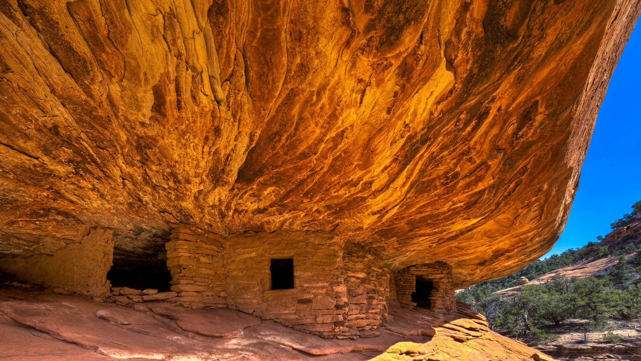 Walk two miles into Utah’s Bears Ears and watch a canyon wall turn orange