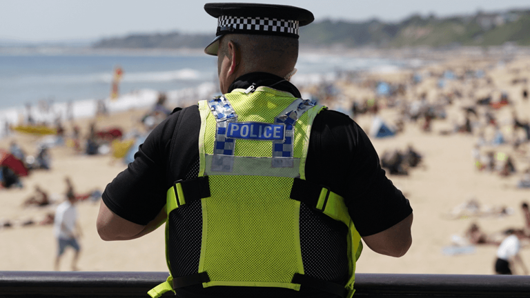 Armed police descend on migrant hotel after machete attack as man ...