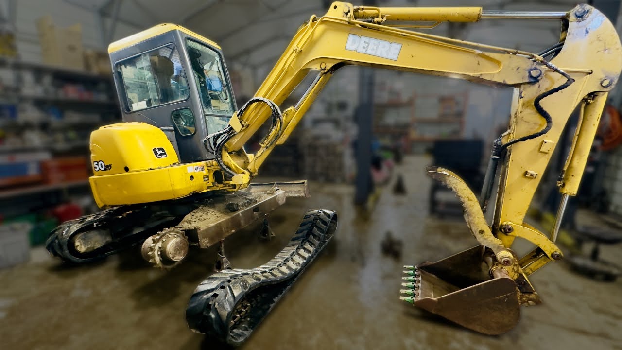 Mini excavator track maintenance to stop squeaking