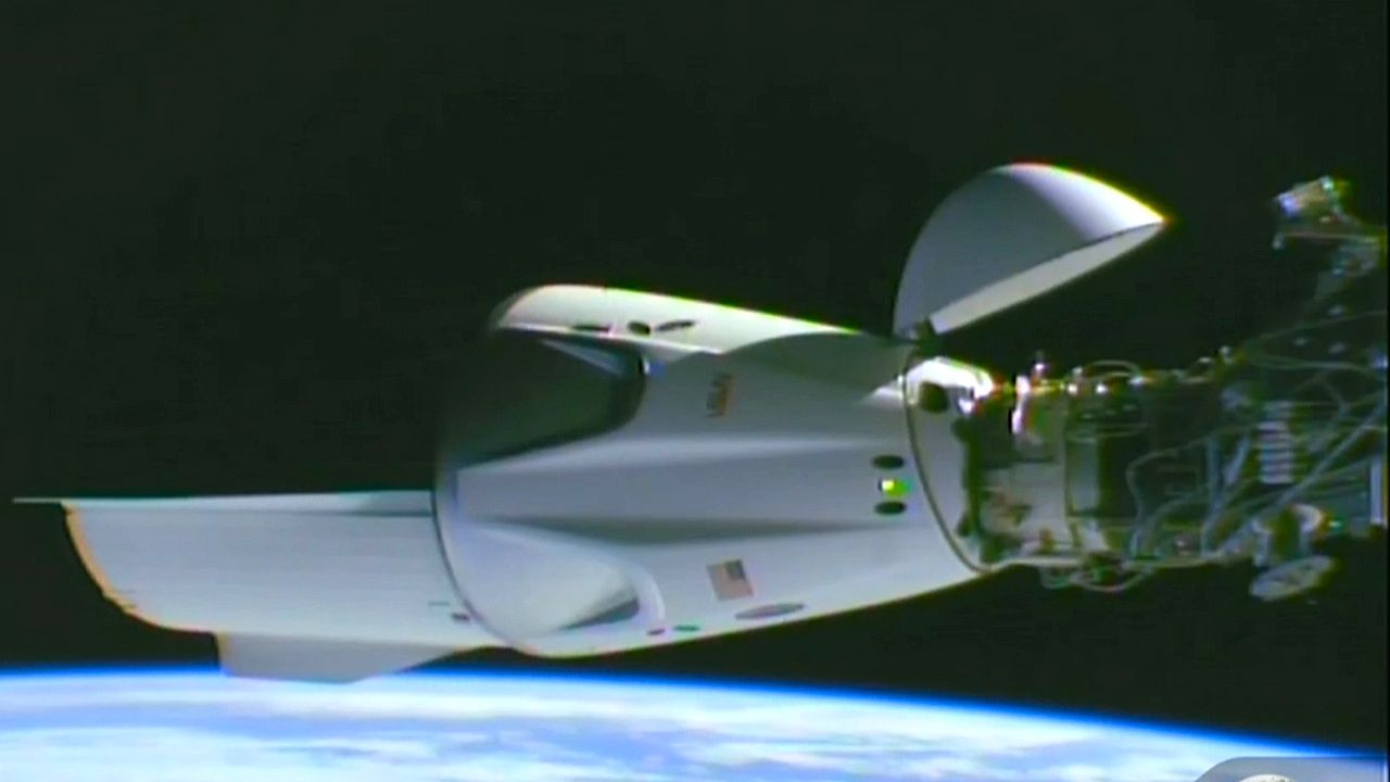 SpaceX Dragon capsule docks with International Space Station in record time