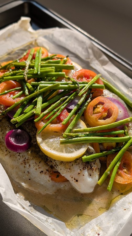 This baked fish in parchment paper is easy, flavorful, and foolproof