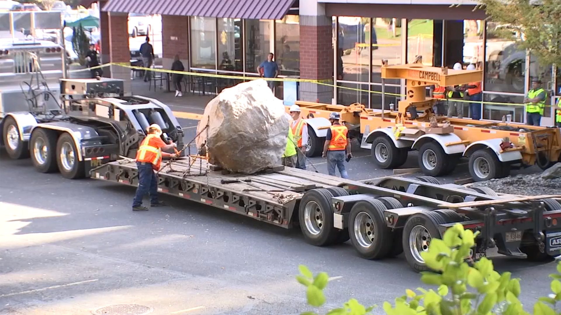 Falling boulder damages QFC grocery store in West Hills area