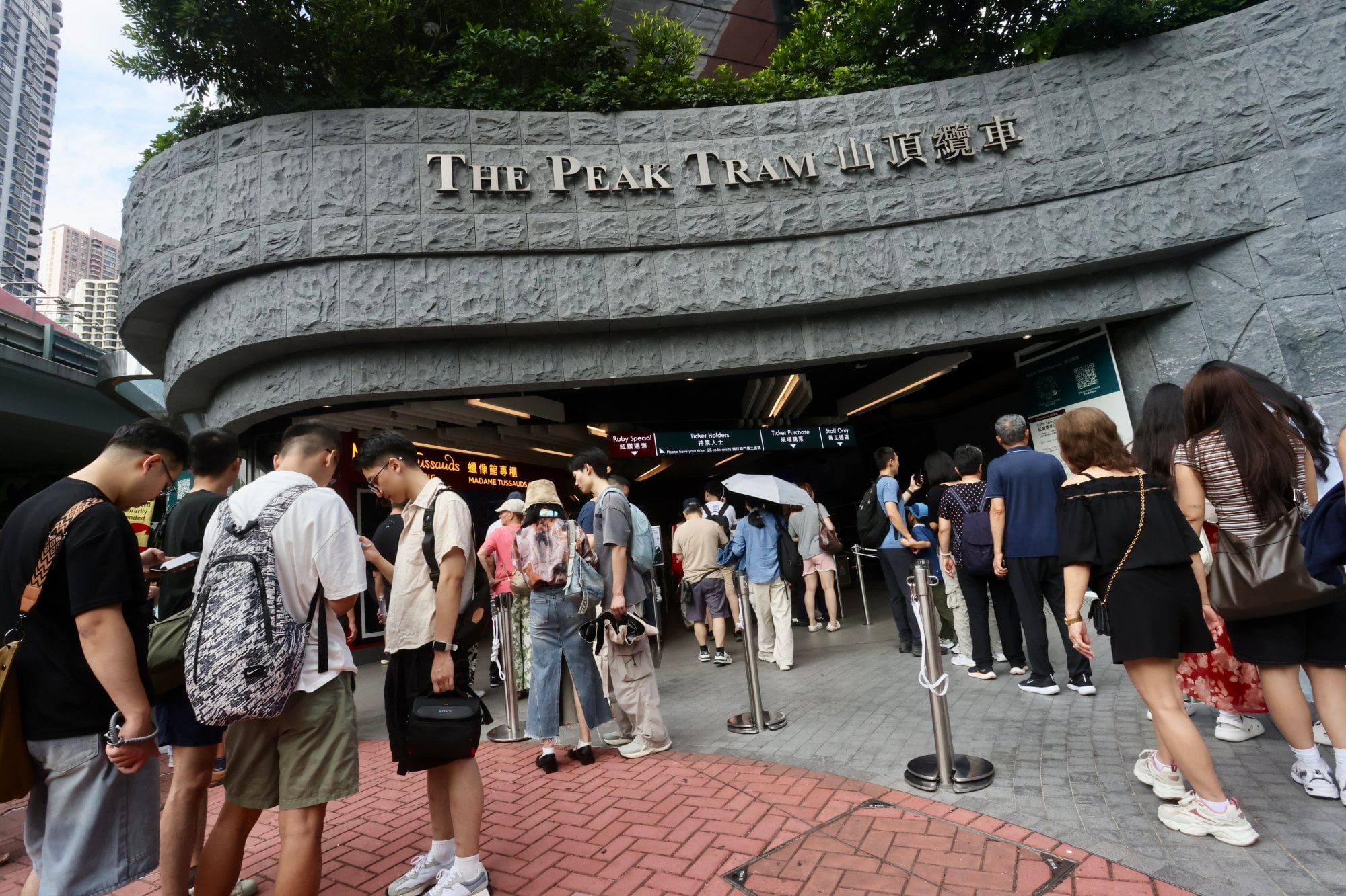 Rain dampens visitor numbers at Hong Kong attractions on day 2 of ...
