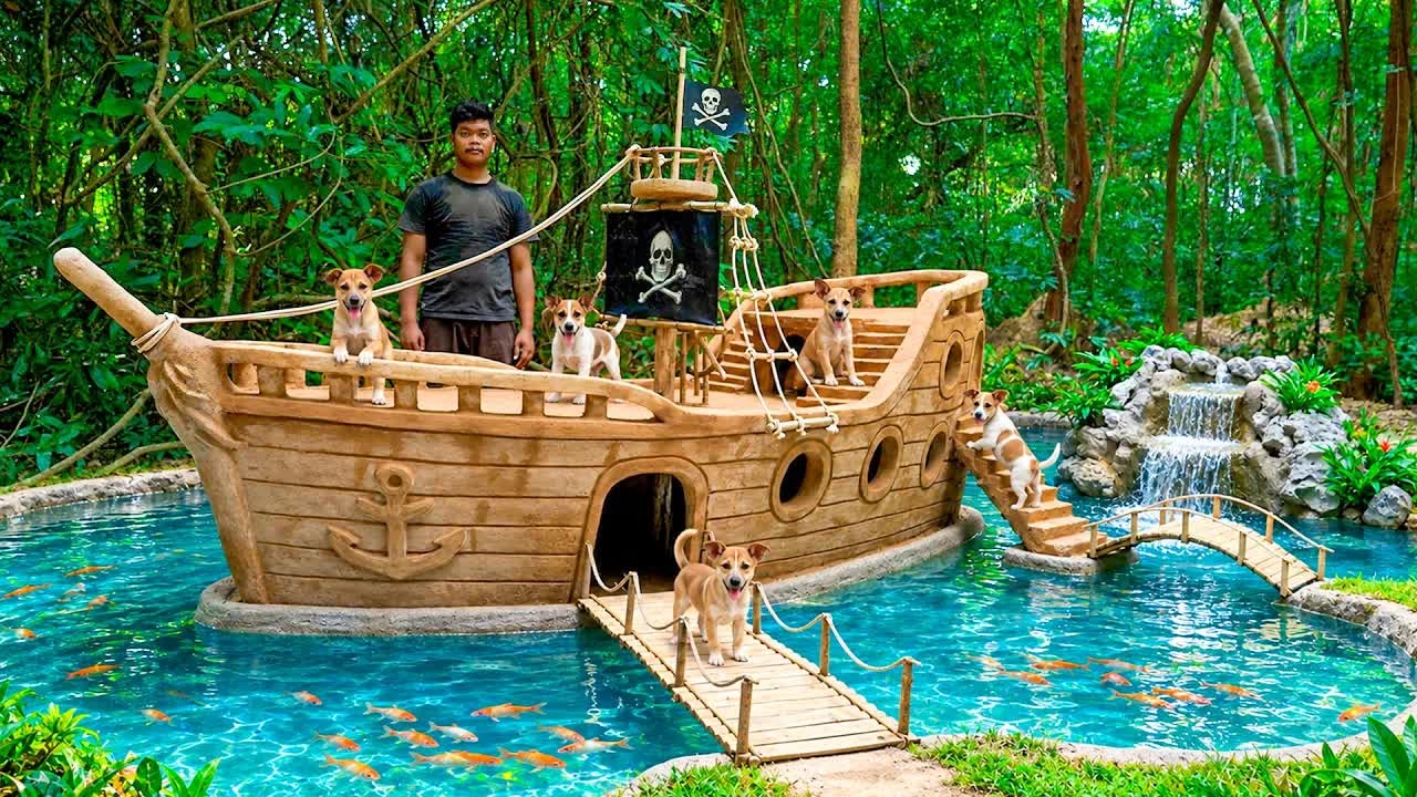I built a giant pirate ship house for rescued puppies, with a waterfall ...