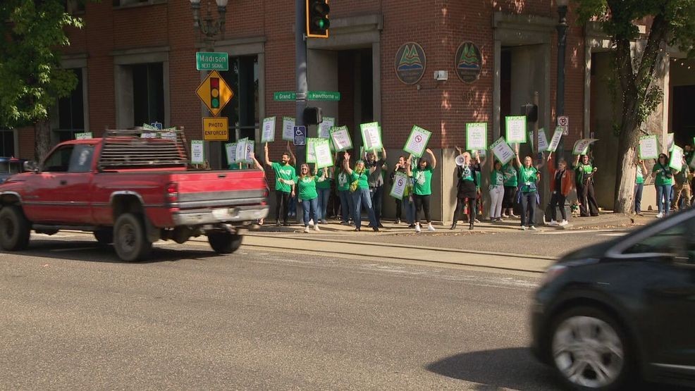 Multnomah County workers picket return-to-office mandate outside ...