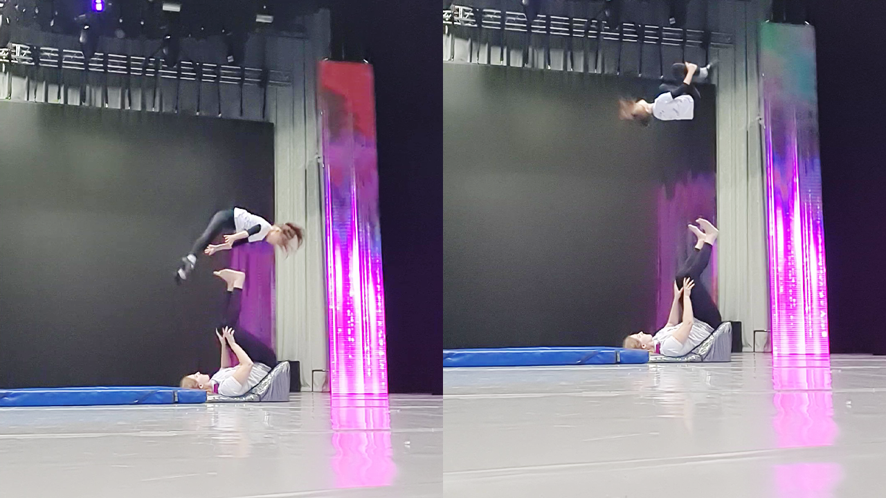 Acrobatic duo practicing for a jaw-dropping human foot juggling act
