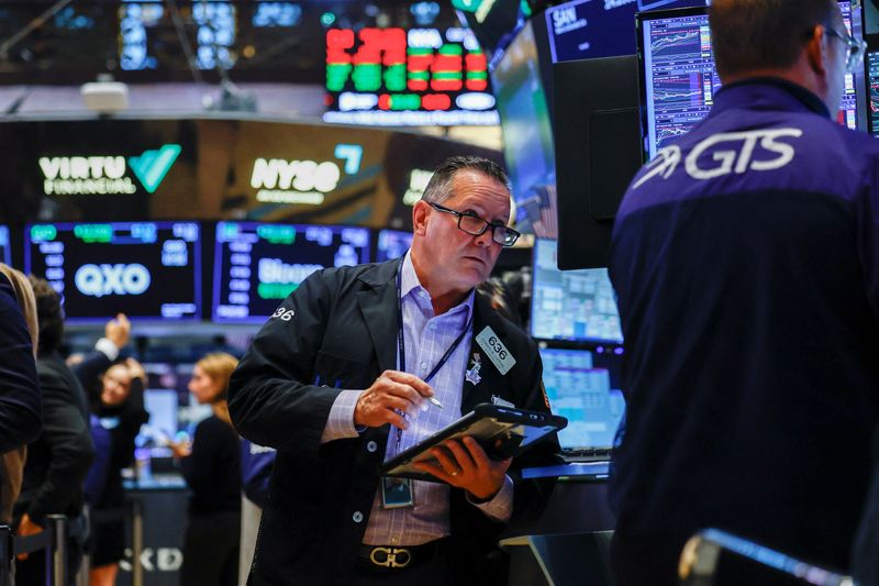 Nasdaq climbs to record after softer jobs data cools rate-hike expectations