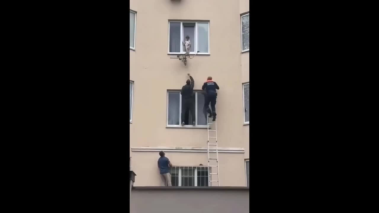 Child rescued from third-floor window of residential building in ...