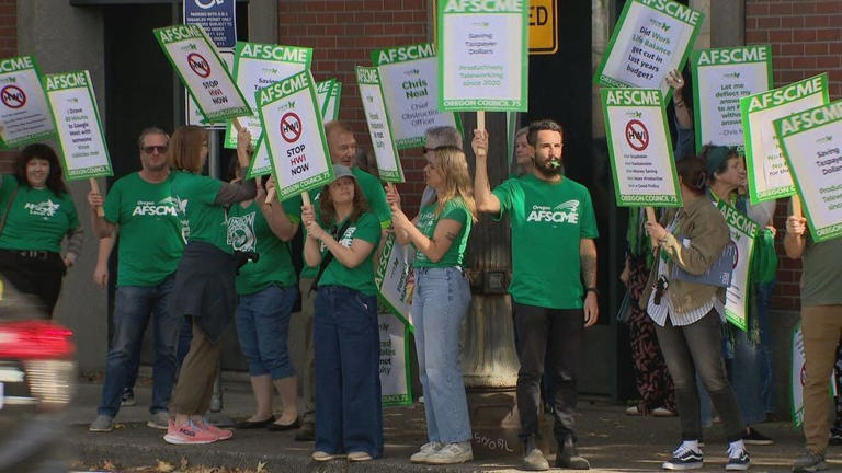Multnomah County workers picket return-to-office mandate outside ...