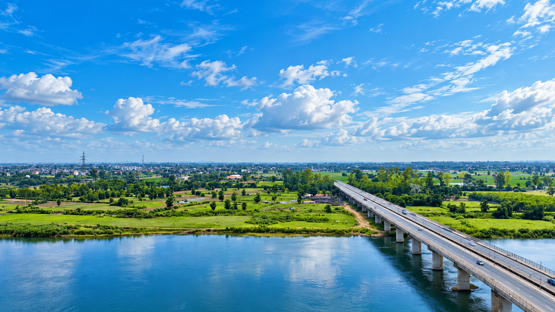 An endless bridge cutting through the Indian countryside
