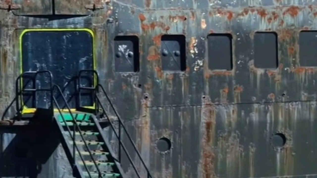 Drone explores massive abandoned ship's rusting hull