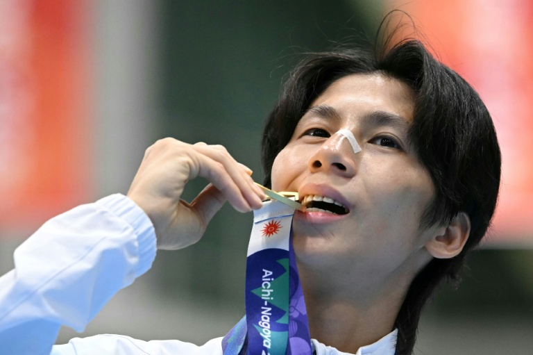 Taiwan boxer Lin wins Games gold as Japan edge North Korea on penalties