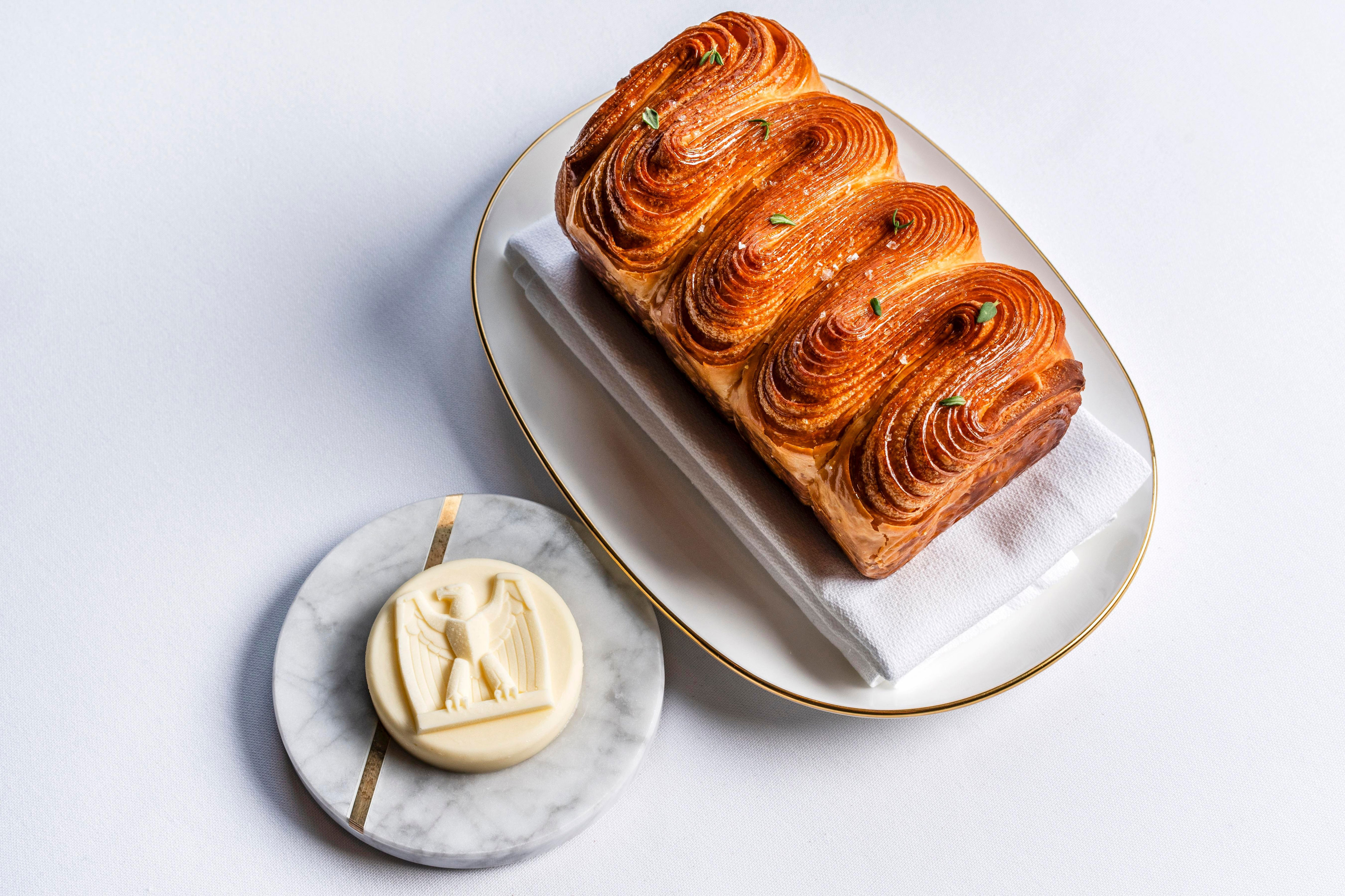 Maximalist tableside duck service is the signature at the Peninsula's Old Post Office
