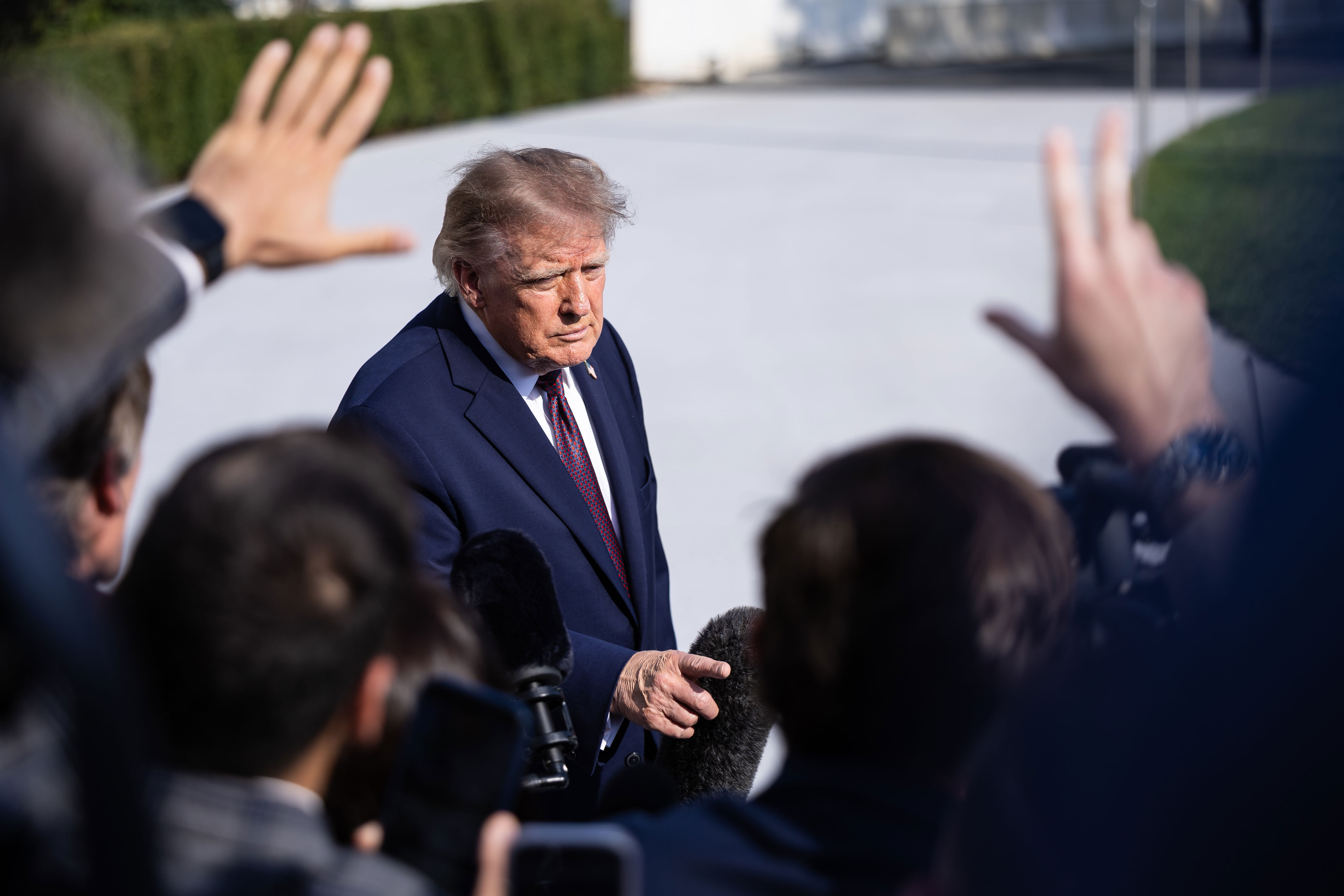 Trump says he'll pay for taxpayer-funded ads praising him after backlash