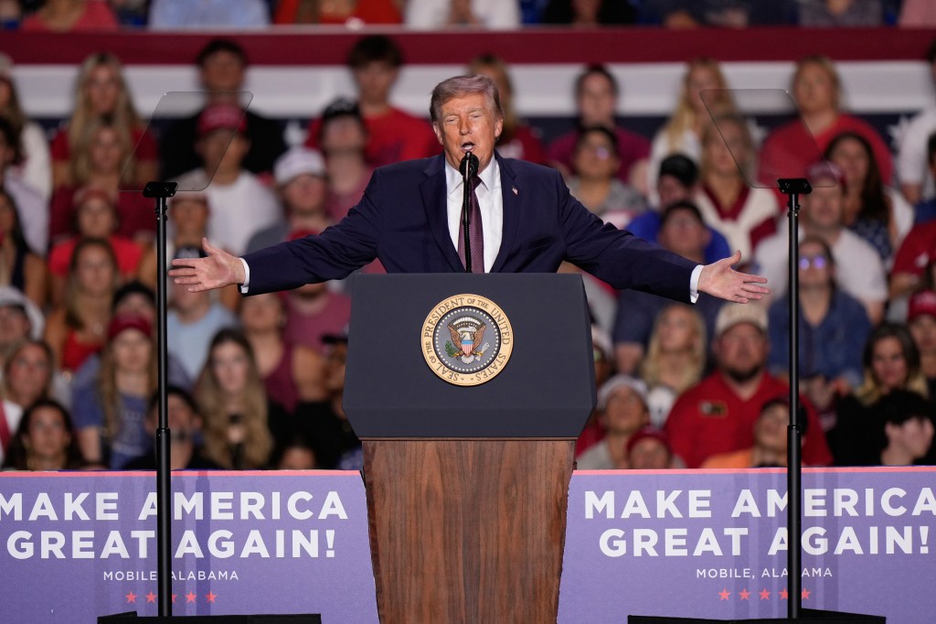 Trump eyes his name on Alabama bridge as rally seats sit empty