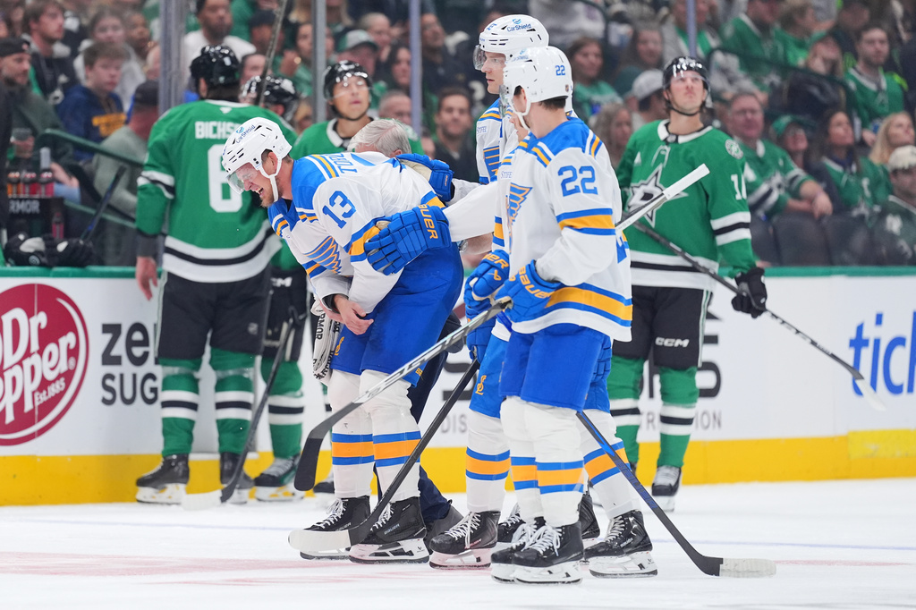 Blues forward Alexy Toropchenko leaves season opener with apparent ...