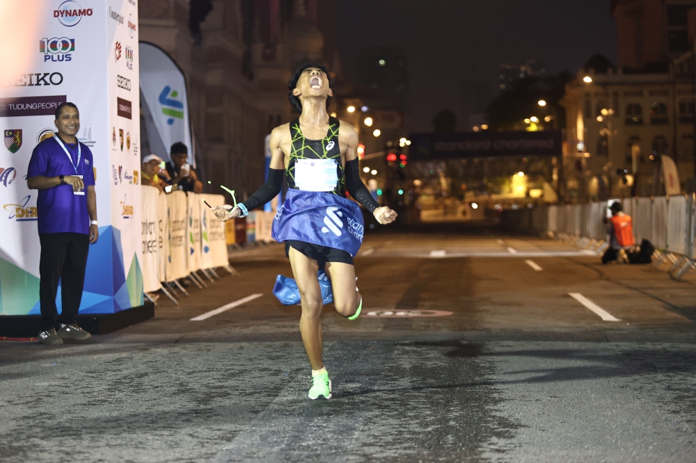 Home glory for Muhammad Haziq as KL Standard Chartered Marathon roars ...