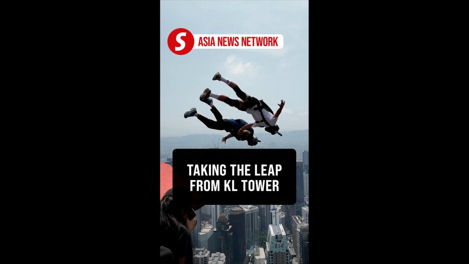 50 BASE jumpers leap from Kuala Lumpur Tower to set Malaysian record