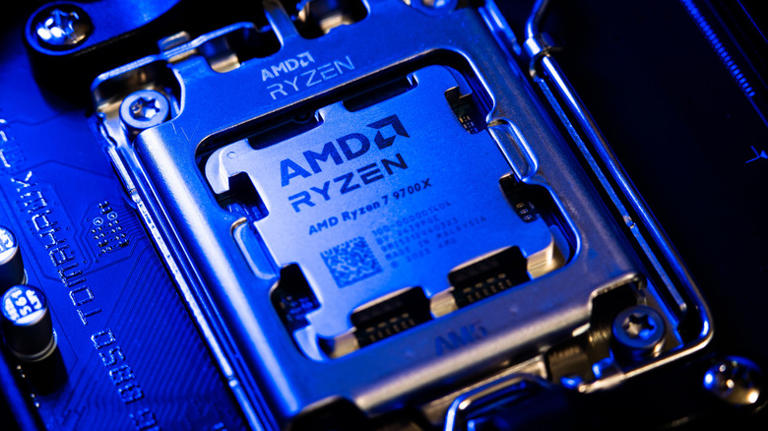 AMD Ryzen 7 9700X inserted into motherboard socket