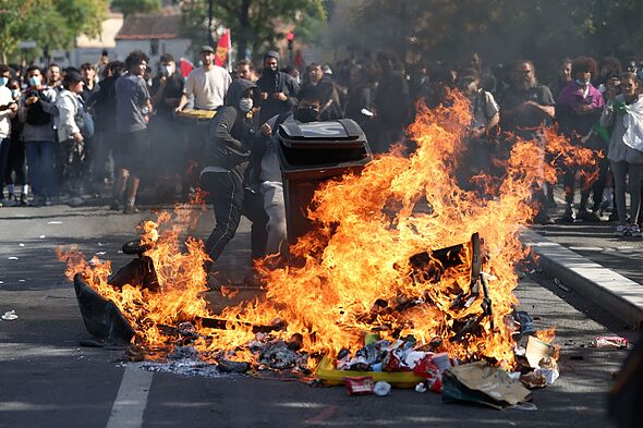 Paris riots: French capital in flames as hundreds of furious protesters ...
