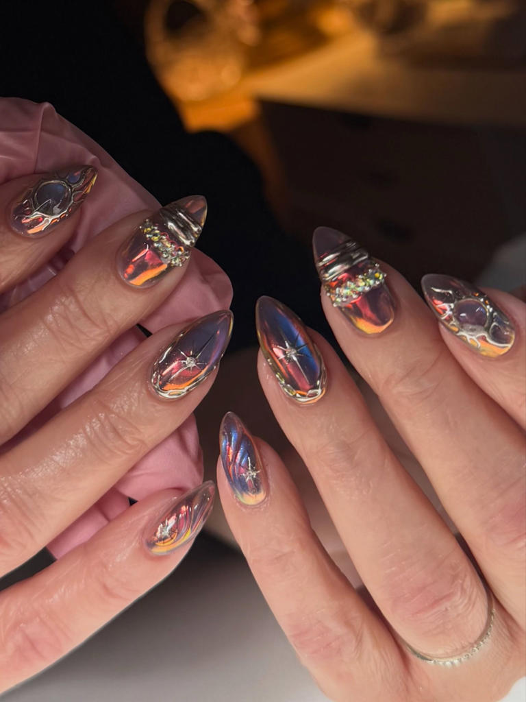 October nail trends feature darker tones and subtle witchy influences