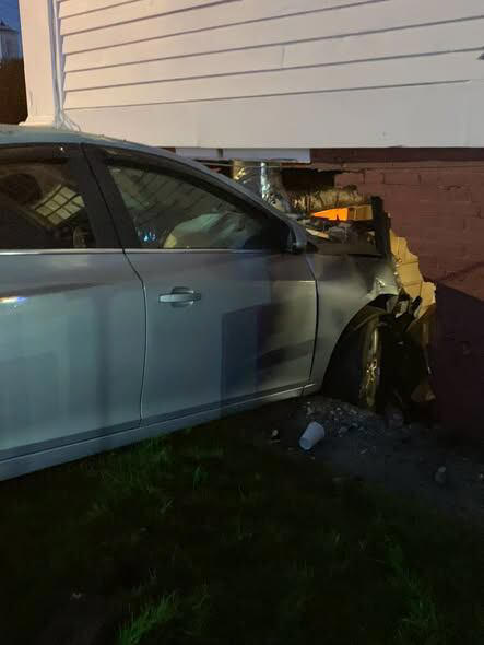 Vehicle crashes into building on Wolf Den Road in Brooklyn