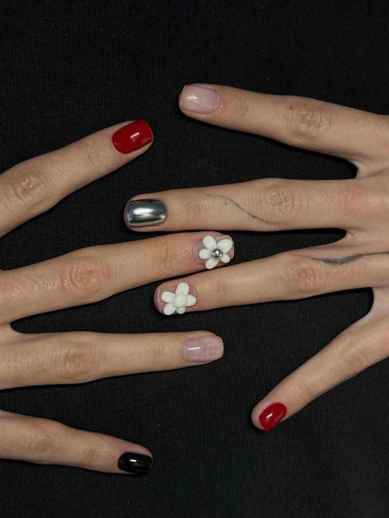 October nail trends feature darker tones and subtle witchy influences