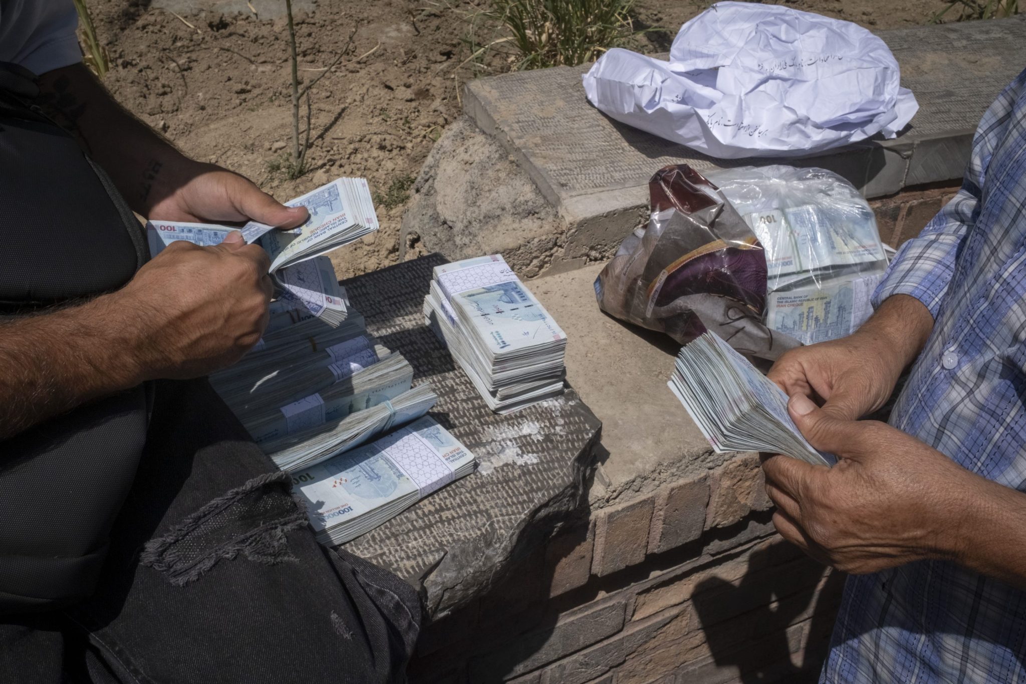 Iran’s currency is getting obliterated as the regime is about to run ...