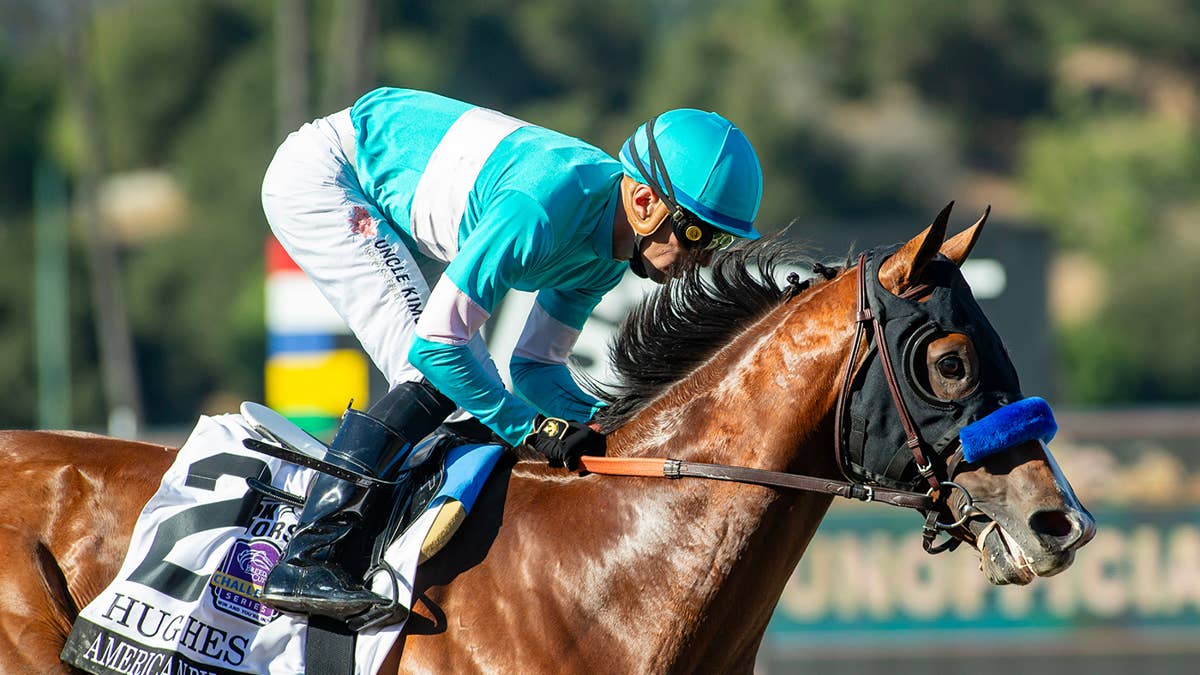 Hughes rolls to fourth straight win in American Pharoah
