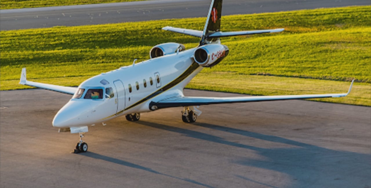 Six missing after air ambulance jet loses contact with company