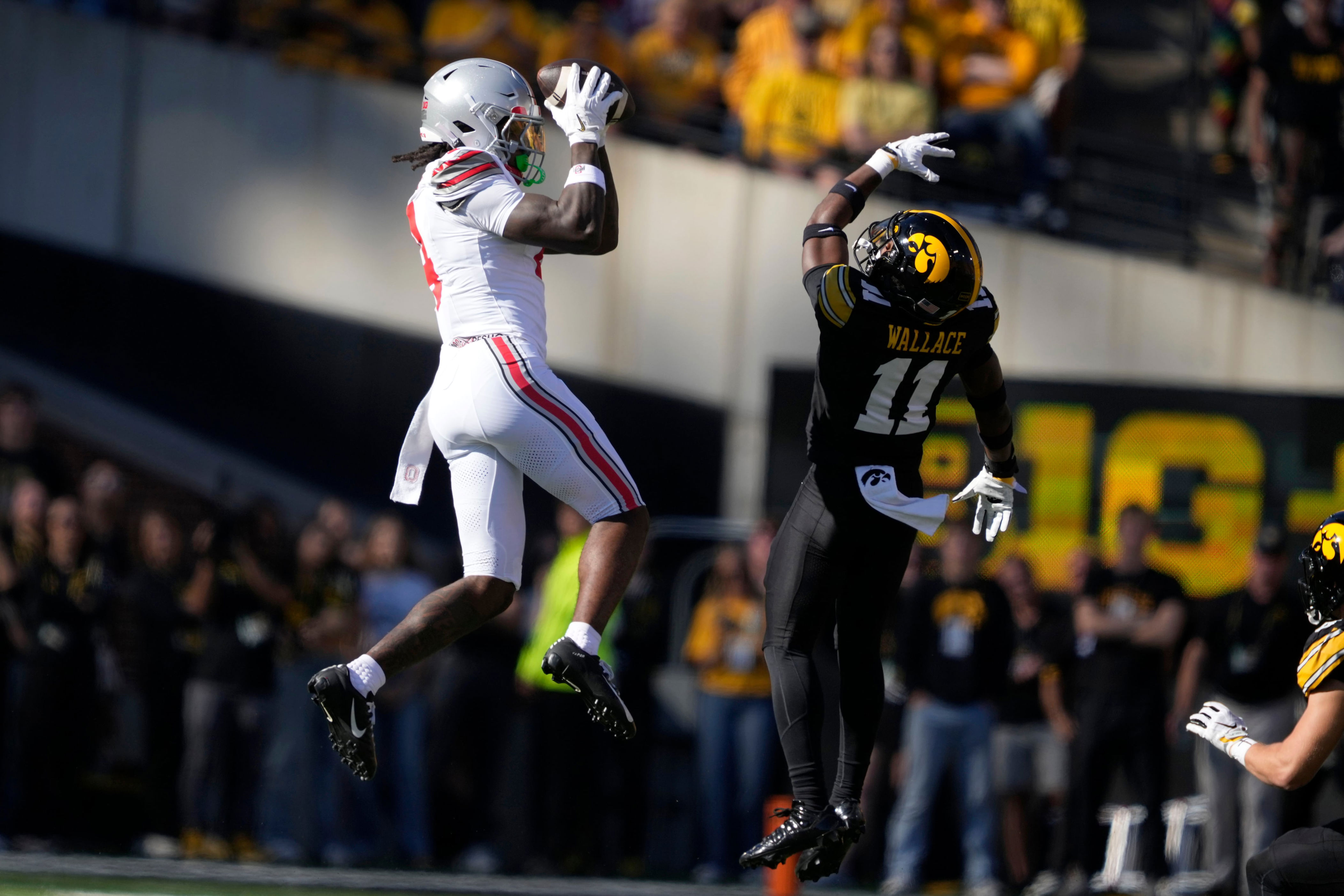 Julian Sayin, Jeremiah Smith lead No. 5 Ohio State past No. 14 Iowa, 31-14