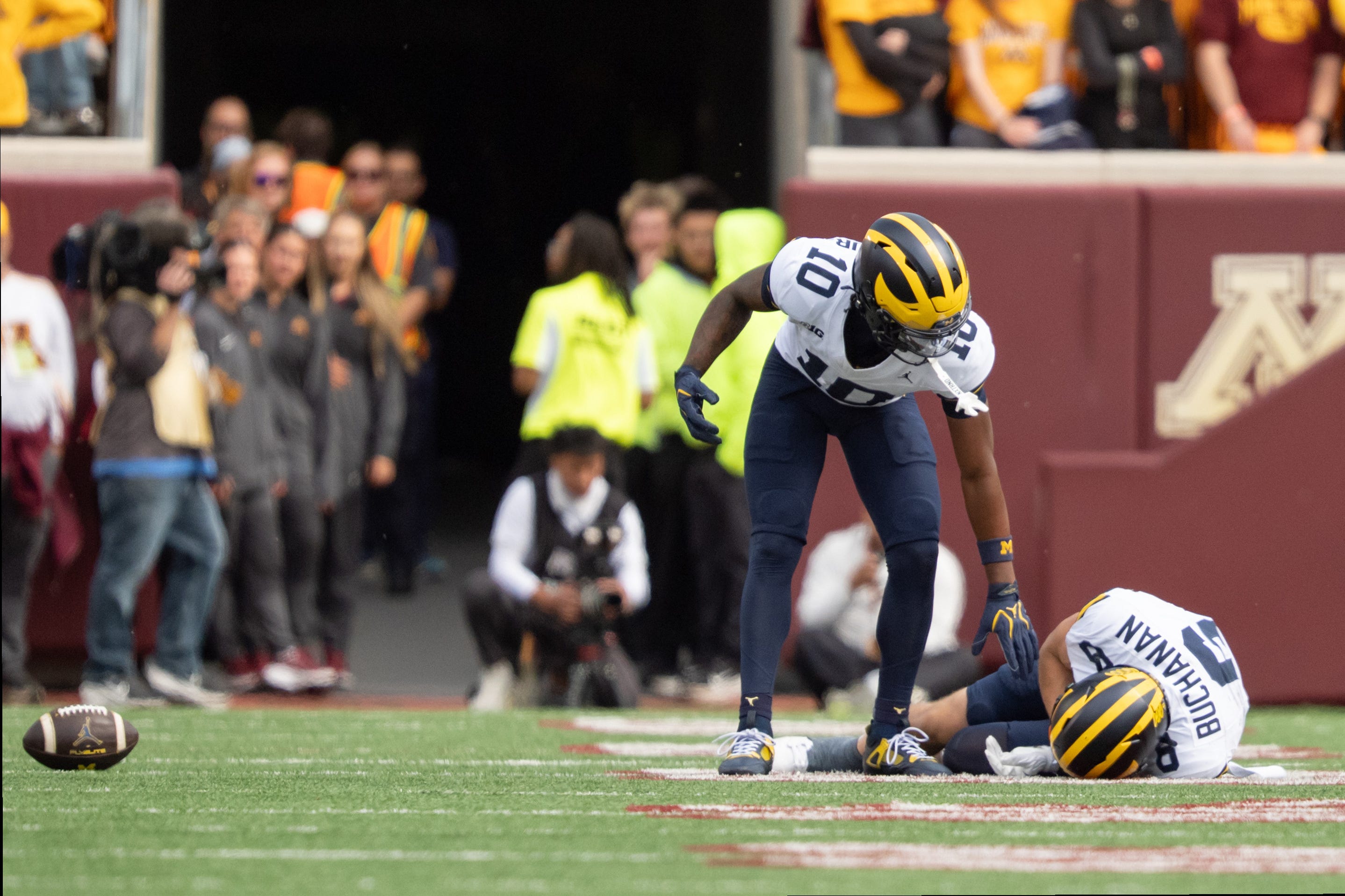 Michigan ejects from college football rankings after Minnesota debacle