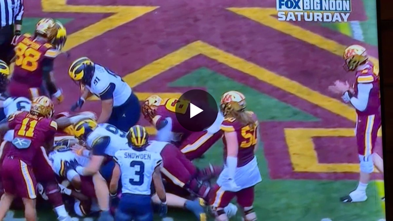 College football player kicks his own quarterback in the groin as ...
