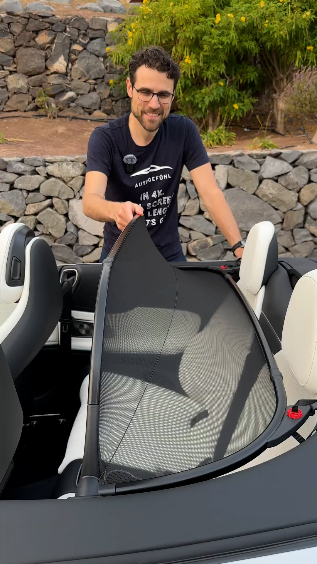 Wind deflector helps make the Mercedes CLE cabriolet cabin more comfortable