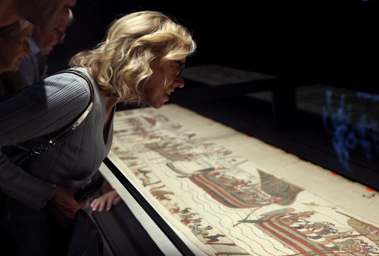 Brits are arguing over who gets to see a 230-foot long embroidered cloth