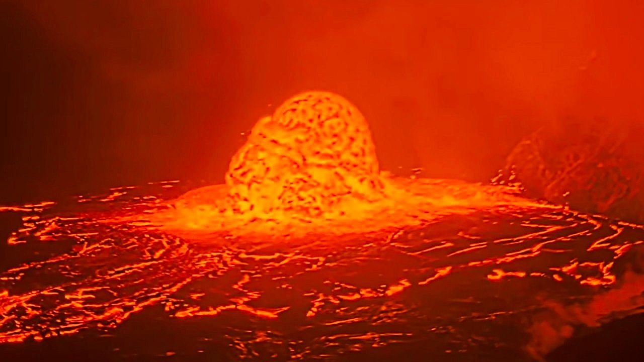 Kilauea erupts with glowing lava dome in spectacular display