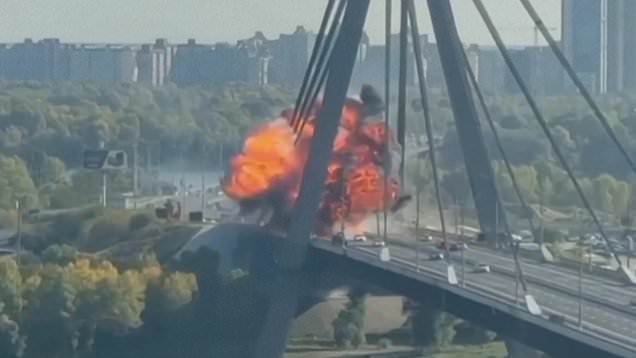 Terrifying moment Russian drone hits Kyiv bridge in huge explosion