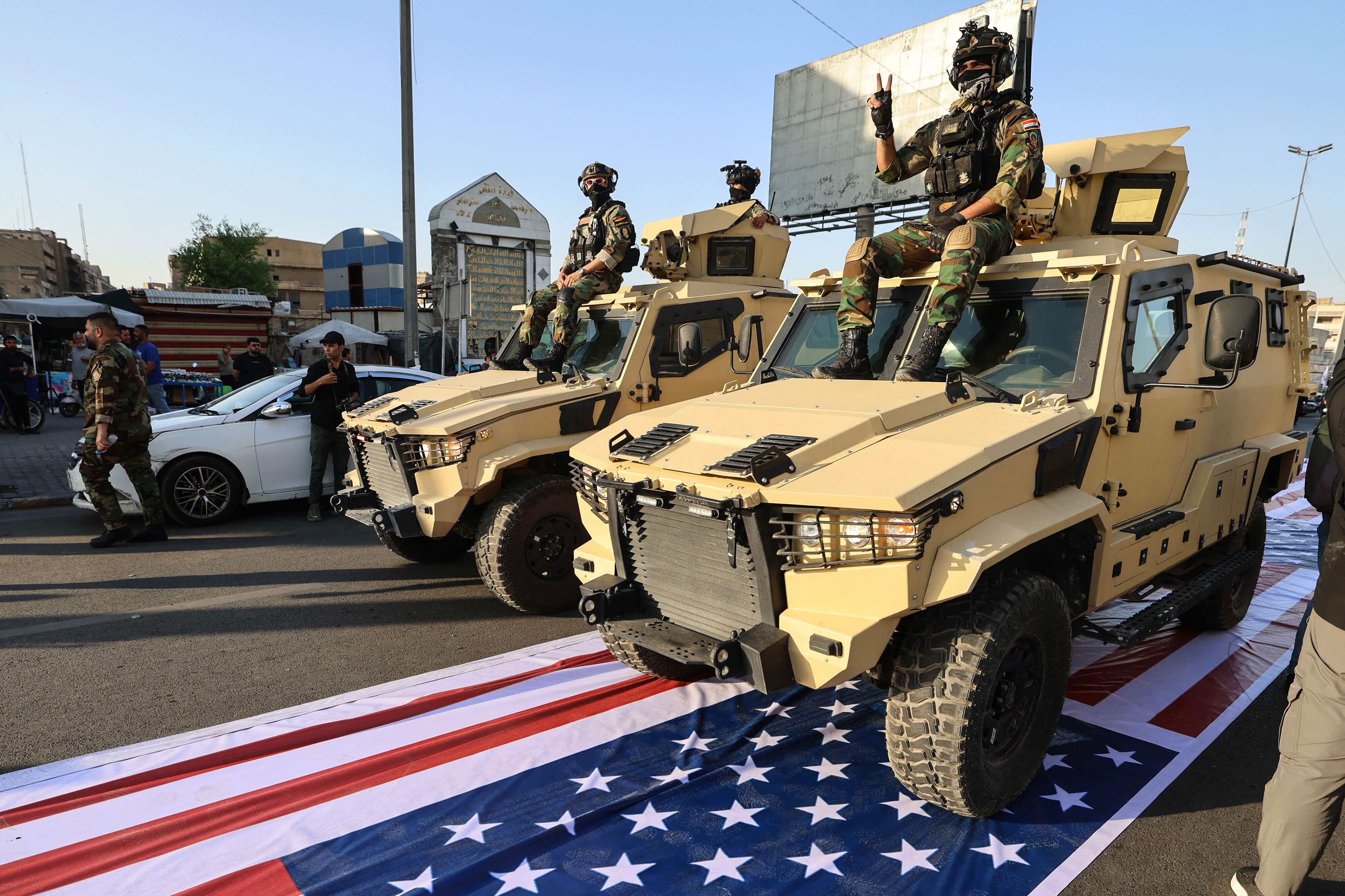 Iraq’s PM orders probe after US flag trampled by Iran-backed militias