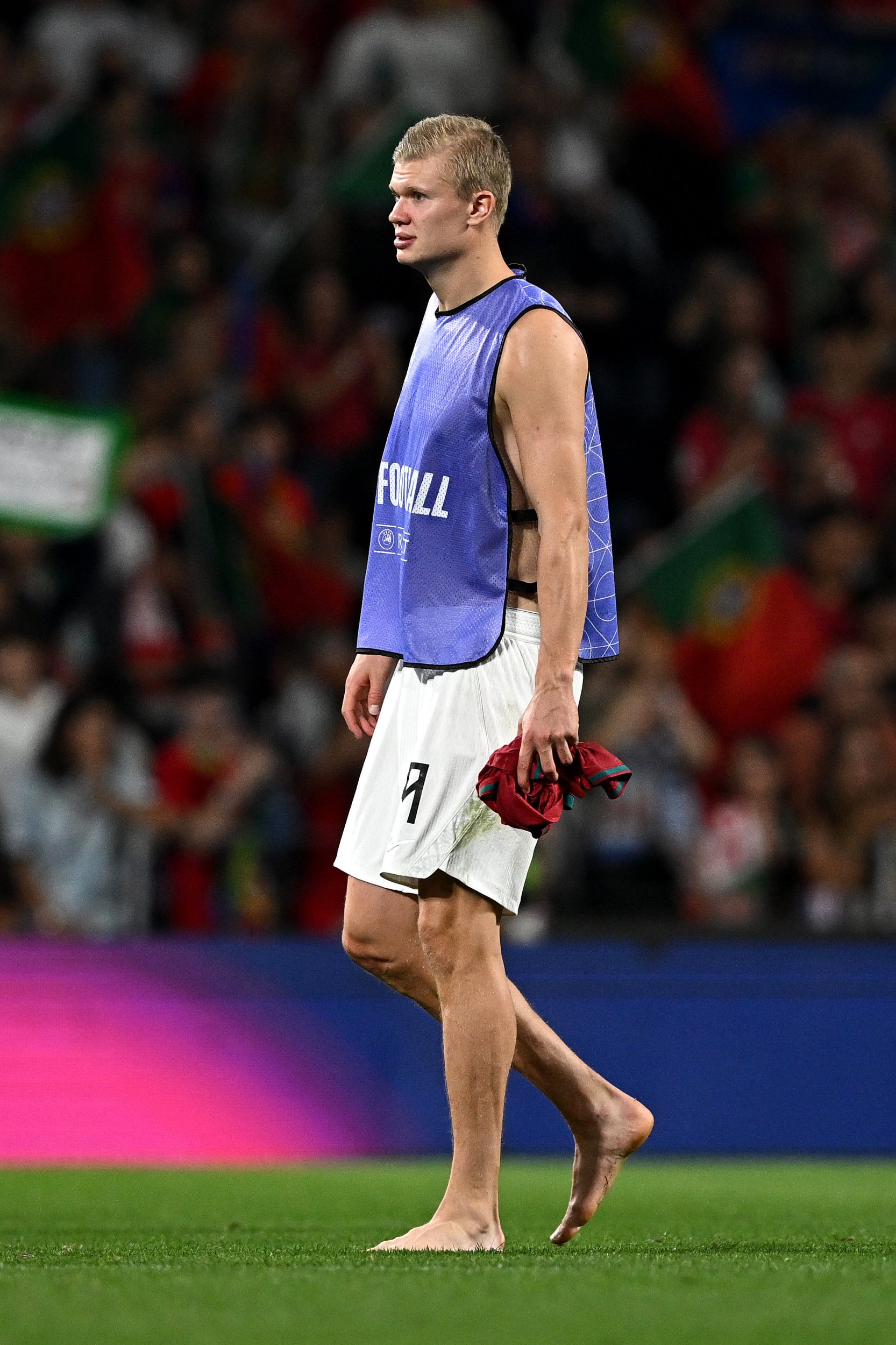 Erling Haaland returned to the pitch without socks on (Picture: Getty Images)