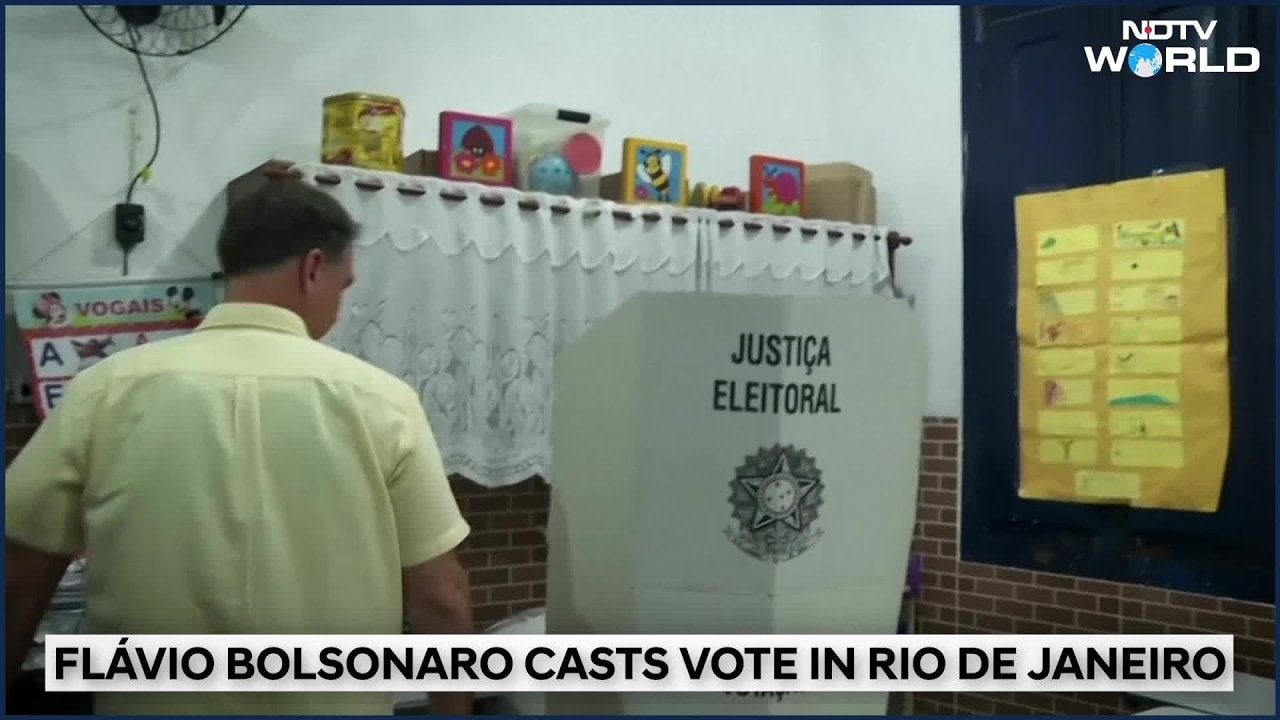 Brazil elections | Opposition candidate Flavio Bolsonaro votes in ...