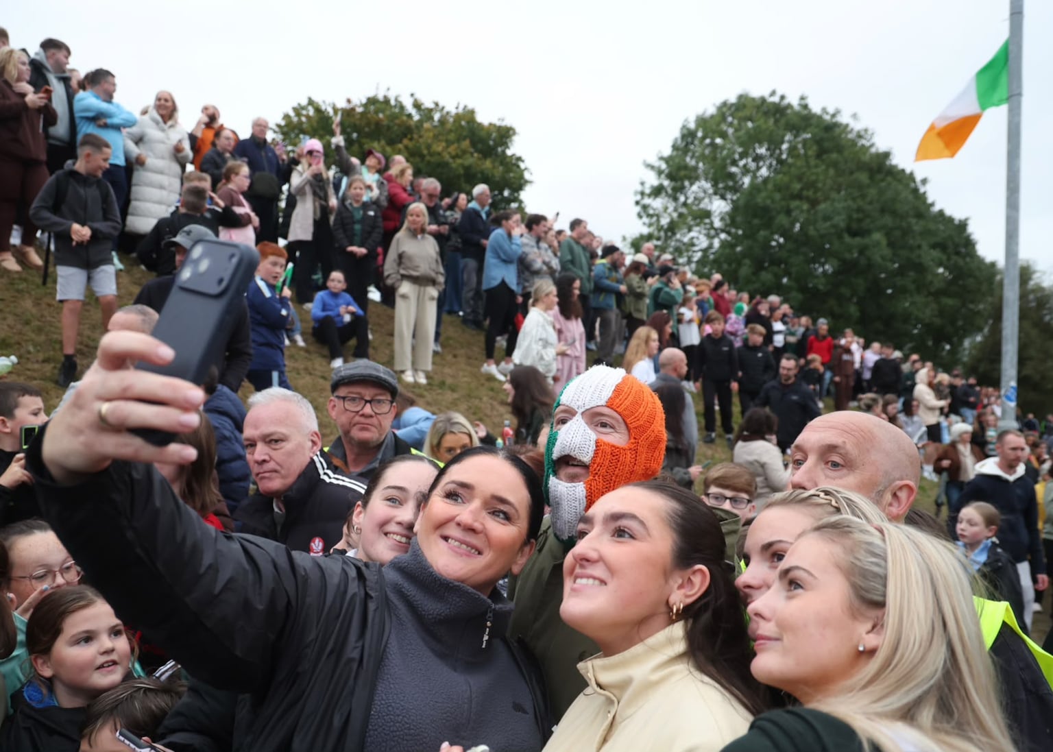 Kneecap mobbed by fans during Garvaghy Road protest visit