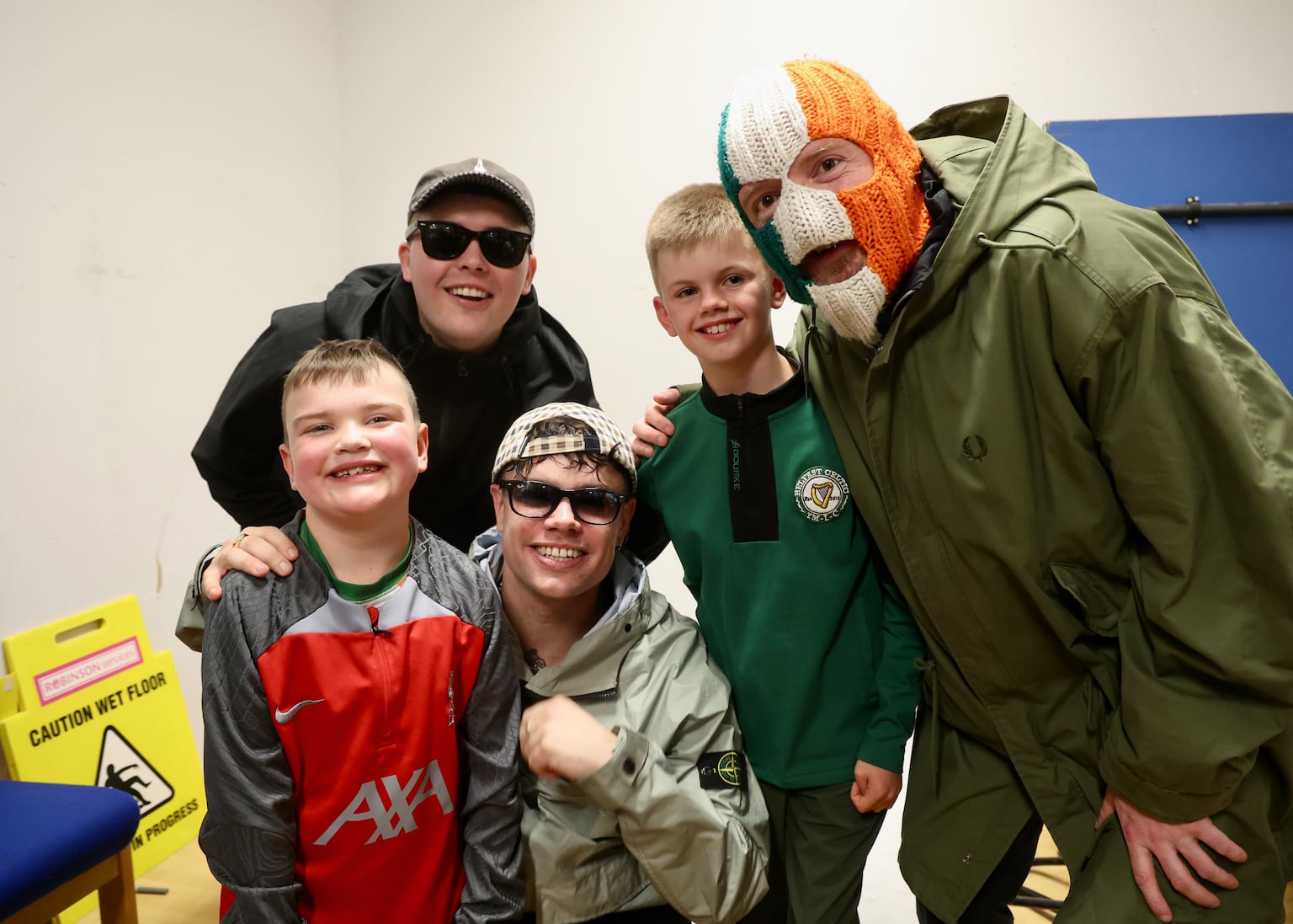 Kneecap mobbed by fans during Garvaghy Road protest visit