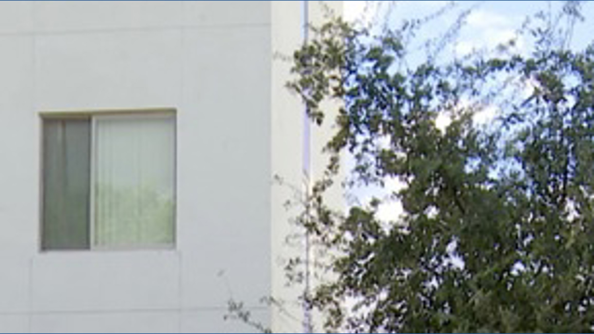 Police search for driver after car hits apartment building