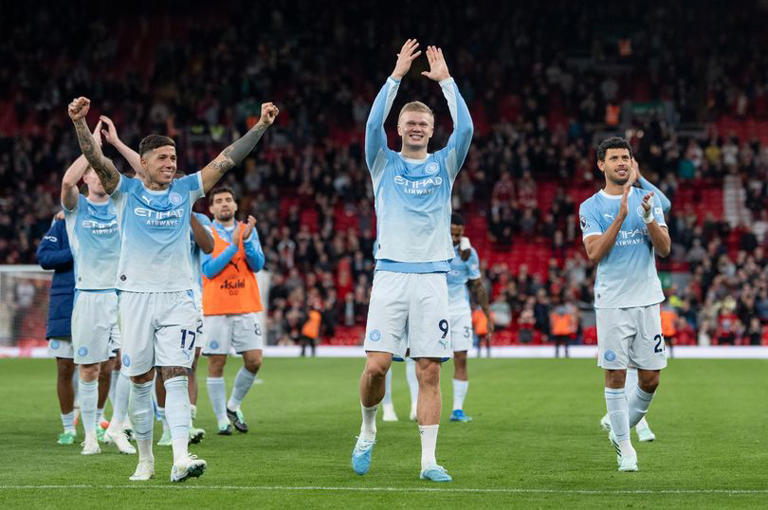 Erling Haaland of Manchester City and Enzo Fernandez of Manchester City thank the fans as they celebrate at full-time in the Premier League 2026/27 match at Anfield