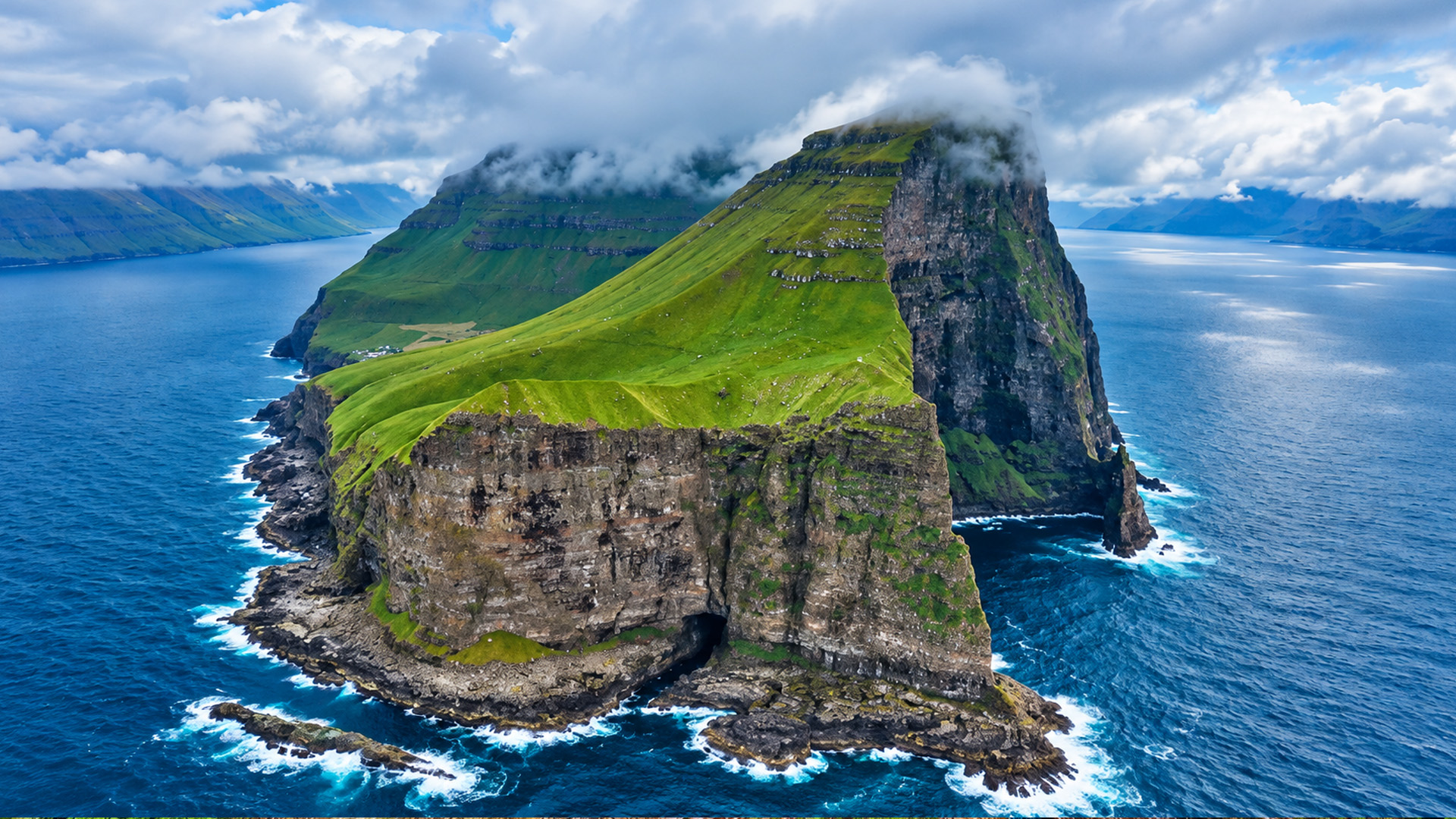 The Atlantic meets almost vertical cliffs in the Faroes