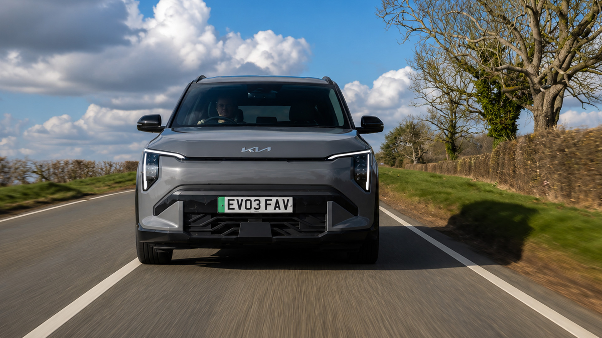 Kia EV3 electric car showcases its minimalist front design on the open road