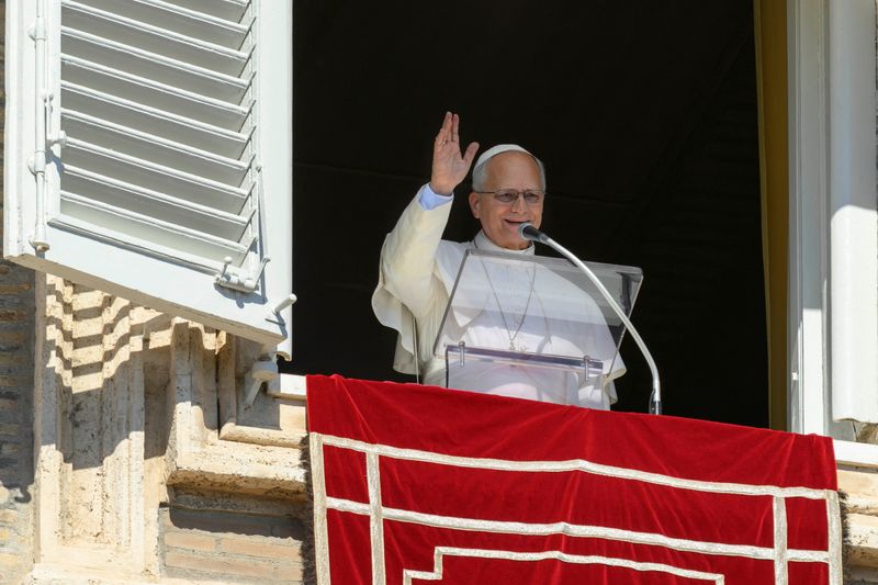 Pope Leo leads the Angelus prayer from the window of the Apostolic Palace at the Vatican, October 11, 2026. Vatican Media/Elisabetta Trevisan/­Handout via REUTERS