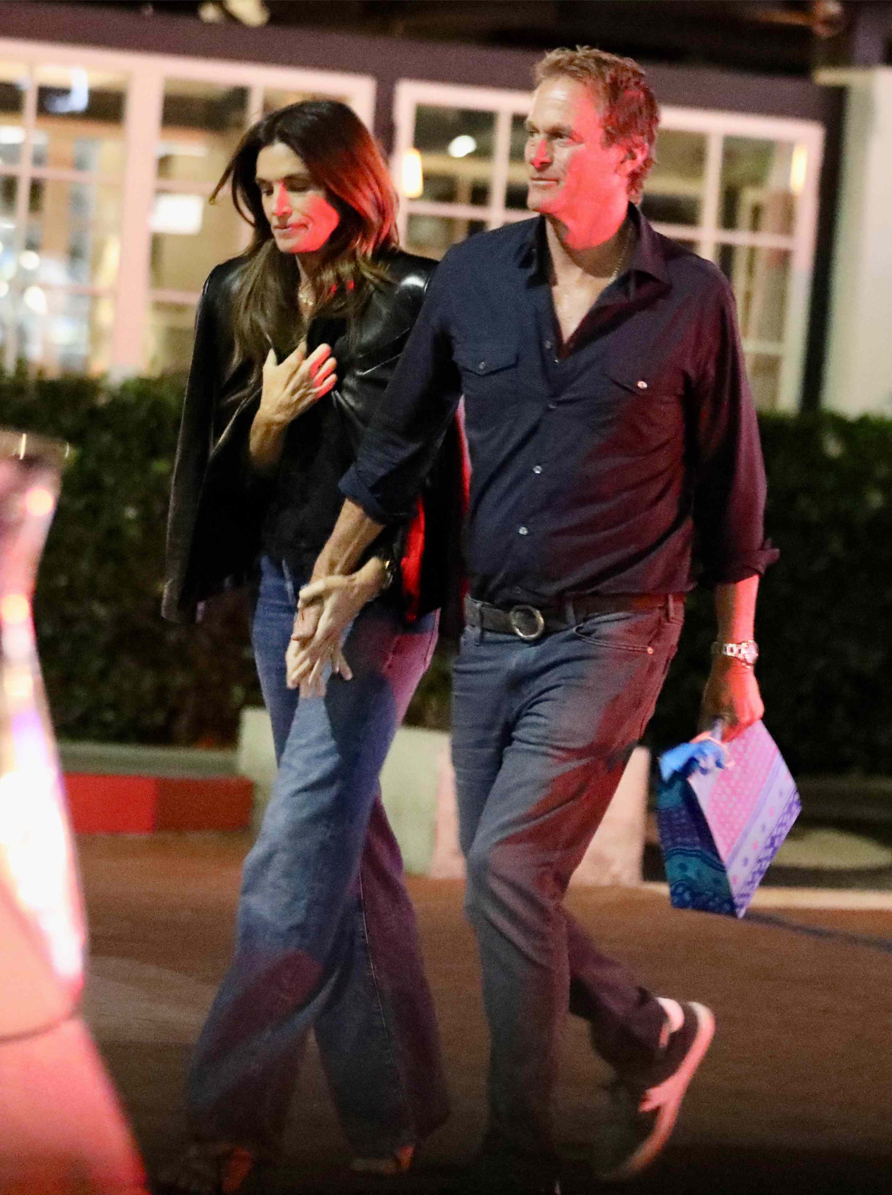 Cindy Crawford and Rande Gerber walk hand-in-hand in first public ...